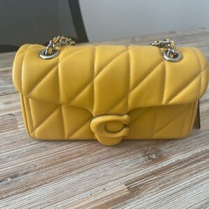 Coach quilted Tabby 20 in color canary.
